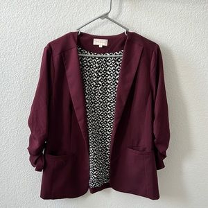 Suit jacket with cropped sleeves